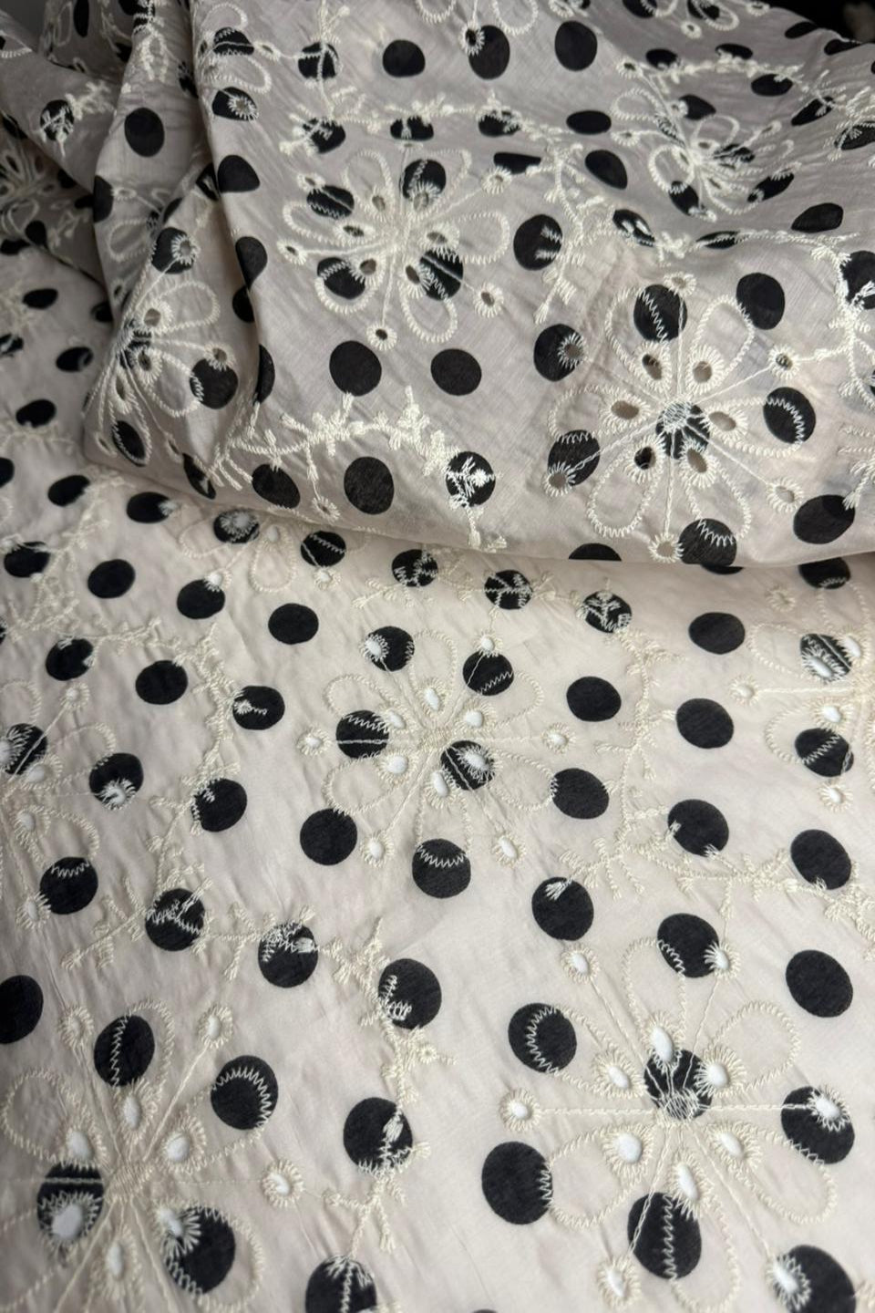 BLACK DOTS WITH LIGHT BEIGE COLOUR
