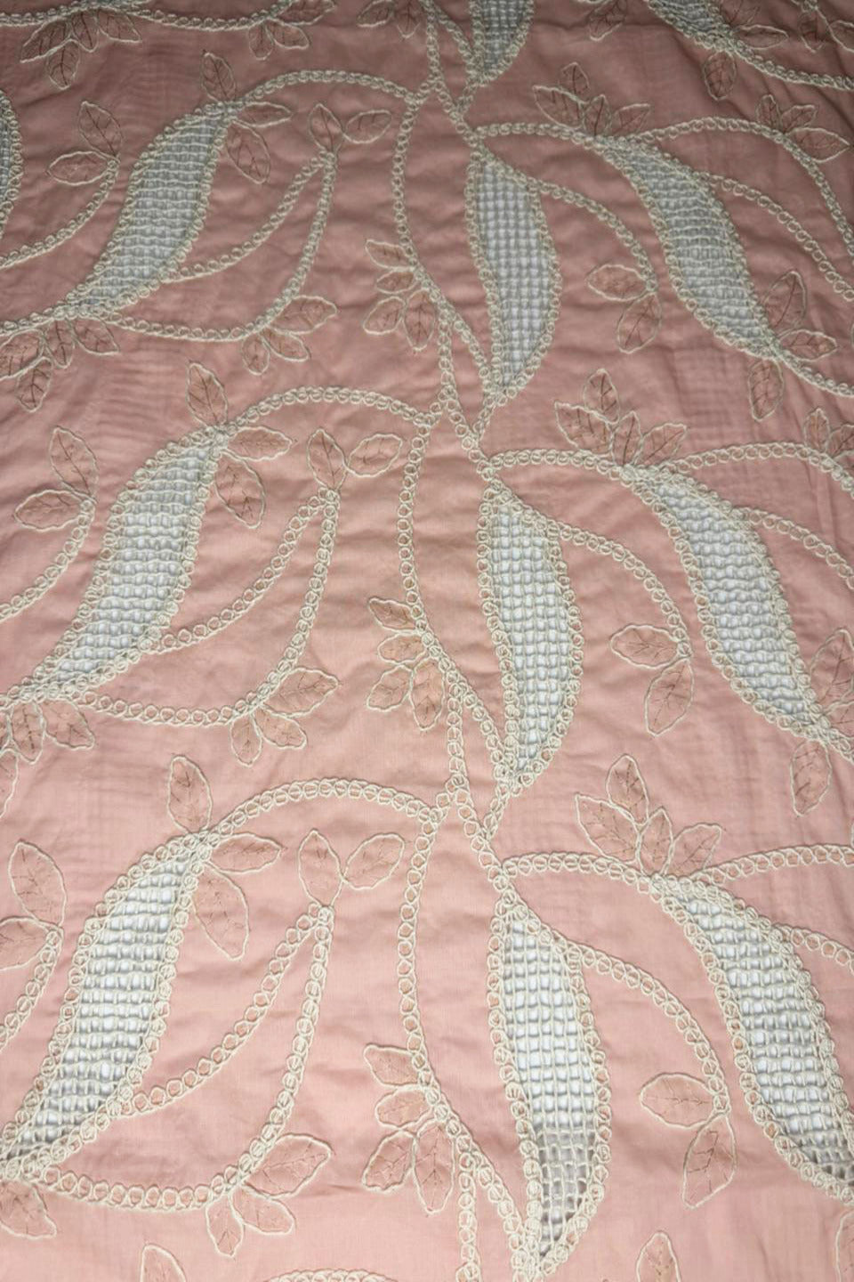 Pink fabric with silver leaf embroidery