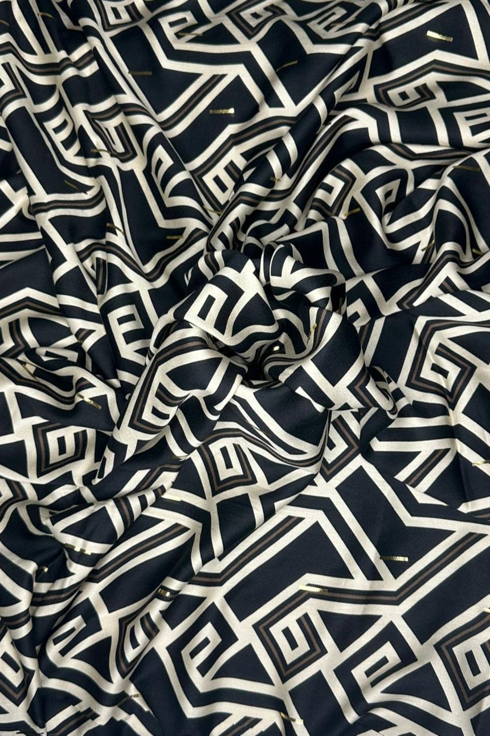 Fabric with black and white geometric pattern