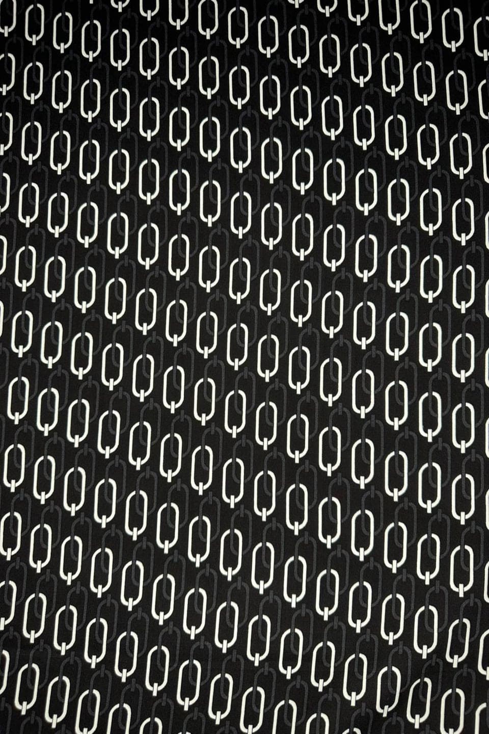 Black background with a white geometric pattern