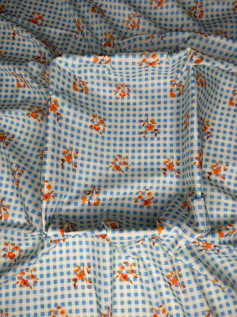 Floral patterned fabric with blue and white checkered background