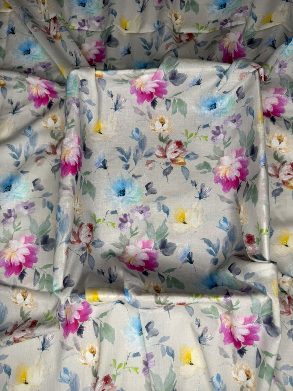 Floral-patterned fabric with colorful flowers on a white background