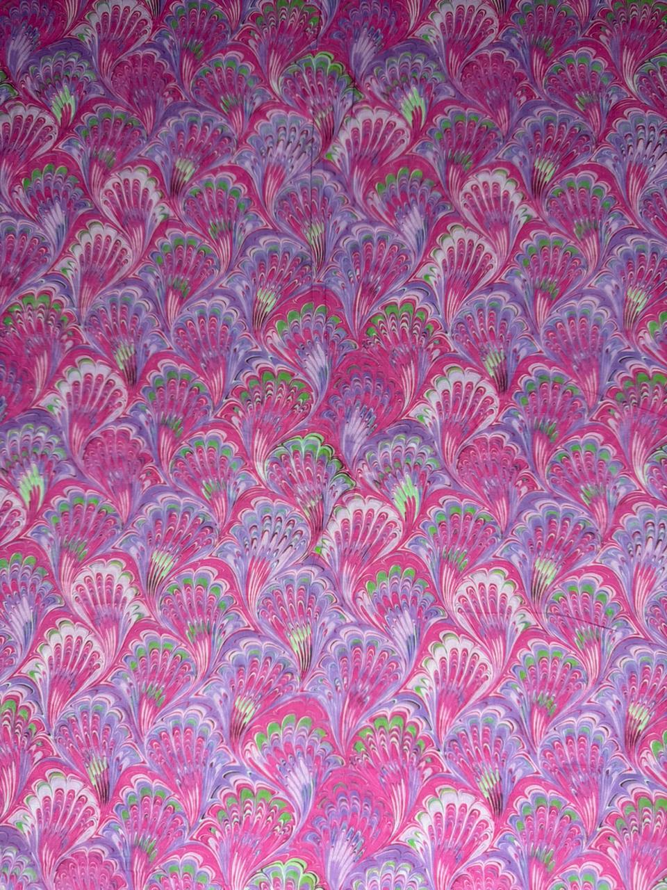 Patterned fabric with pink and purple design
