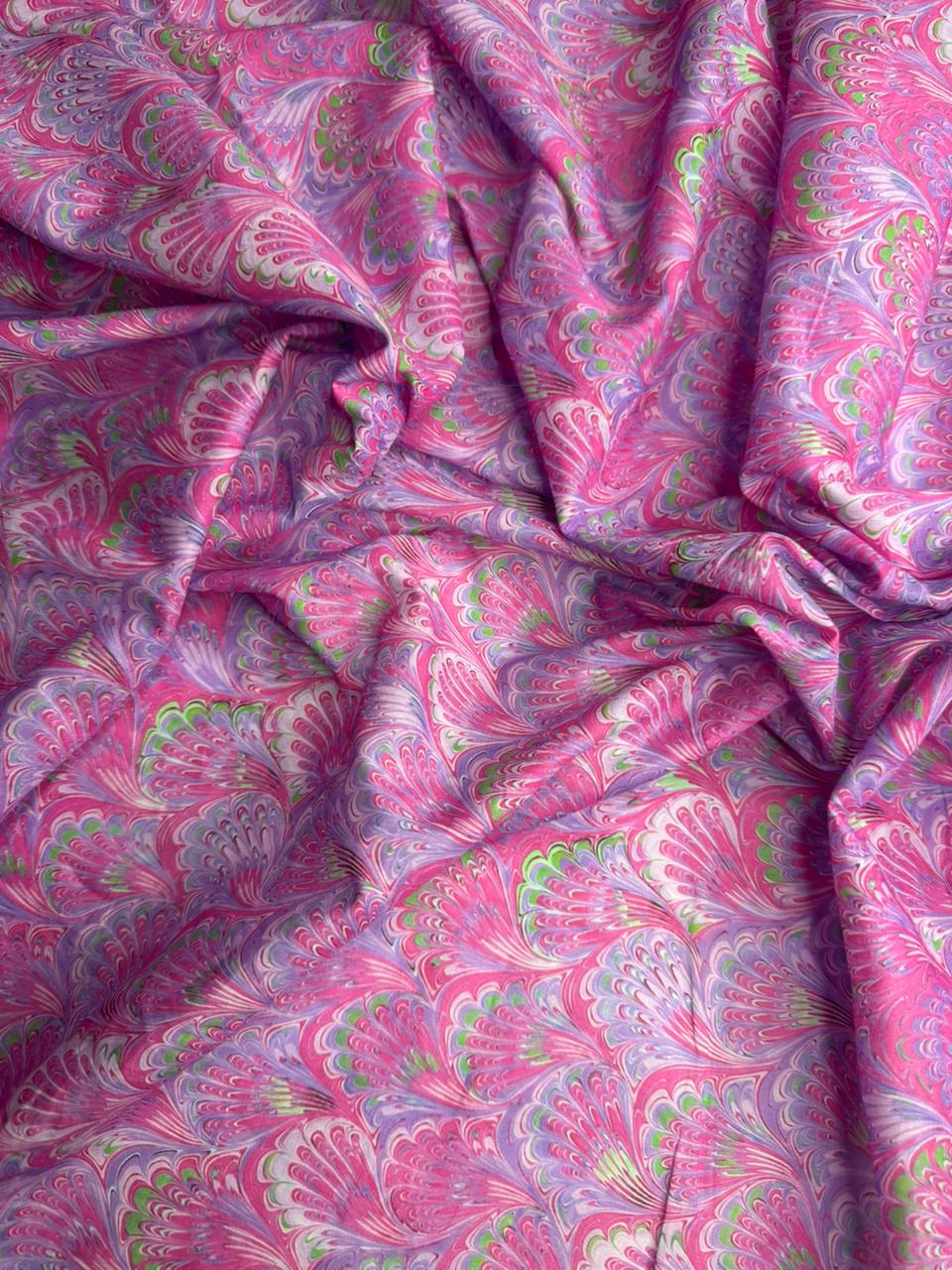 Pink fabric with green floral pattern