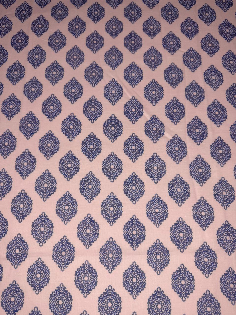 Patterned fabric with blue geometric design on a pink background