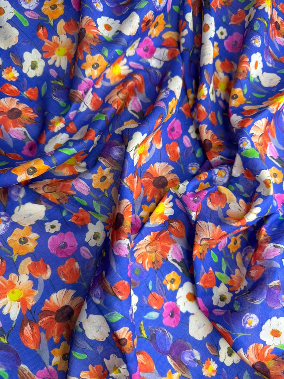 Colorful floral pattern on a blue background