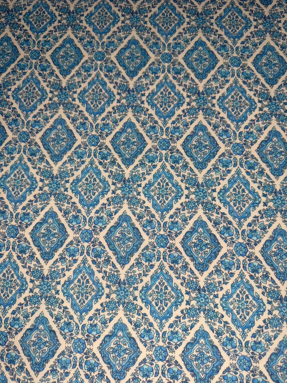 Patterned fabric with blue and beige diamond design