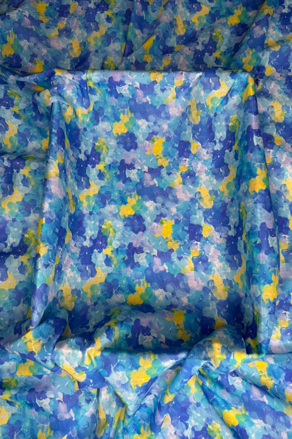 Blue and yellow floral patterned fabric
