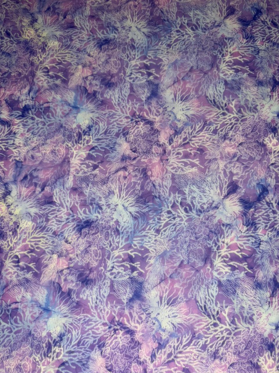 Fiberglass mesh with a floral pattern in purple and green tones