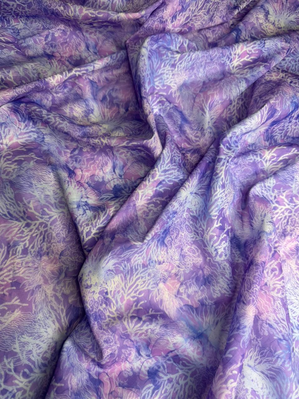 Close-up of purple and green patterned fabric