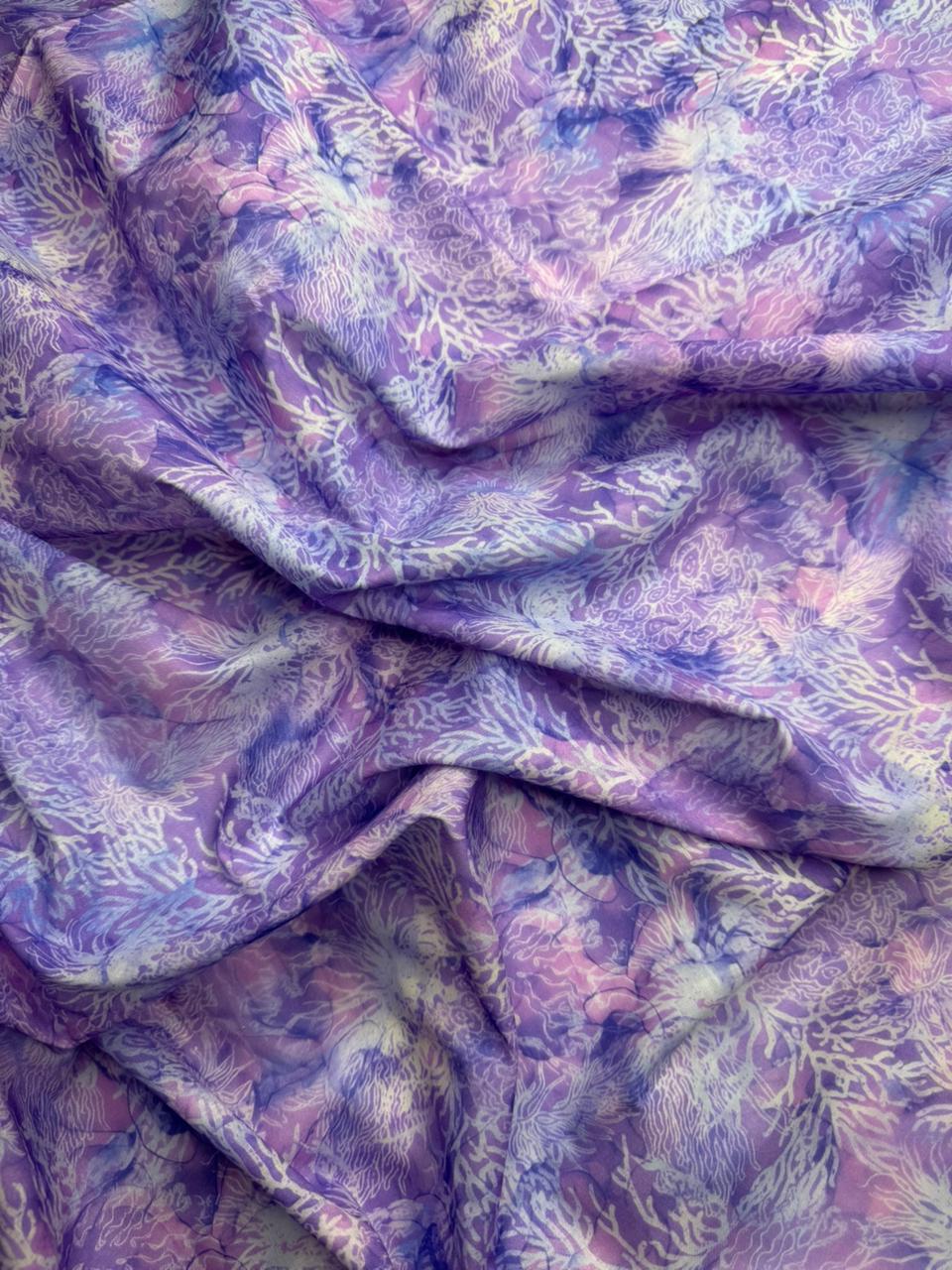 Purple and pink floral patterned fabric