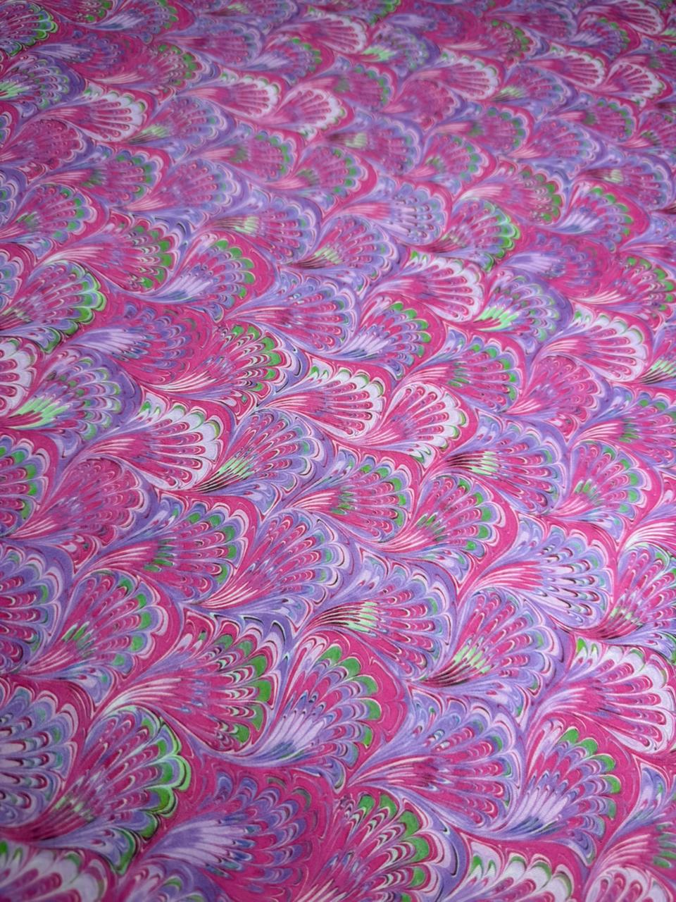Patterned fabric with pink and purple design