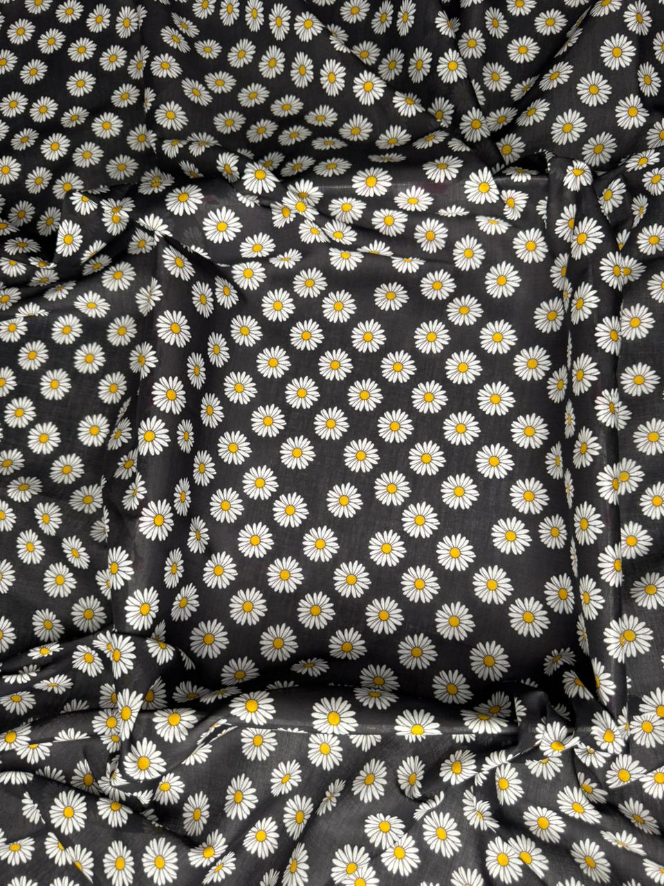 Black fabric with white daisy pattern