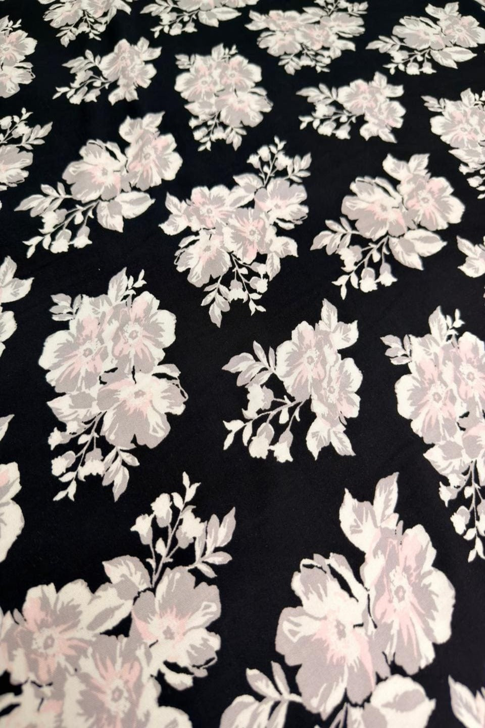 Luxury Imported Stone Linen – Soft Pink Floral Printed Fabric in Black (4 Yards)