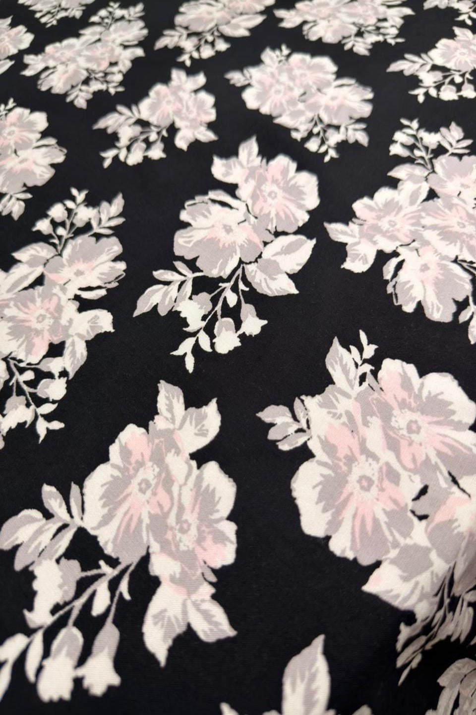 Luxury Imported Stone Linen – Soft Pink Floral Printed Fabric in Black (4 Yards)