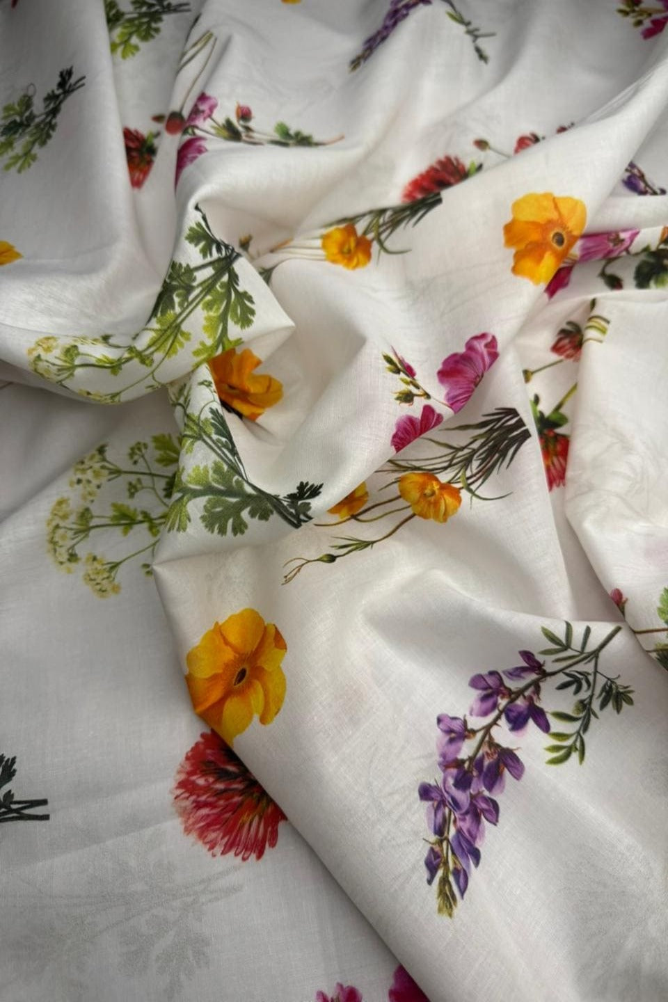 Floral fabric with colorful flowers on a white background