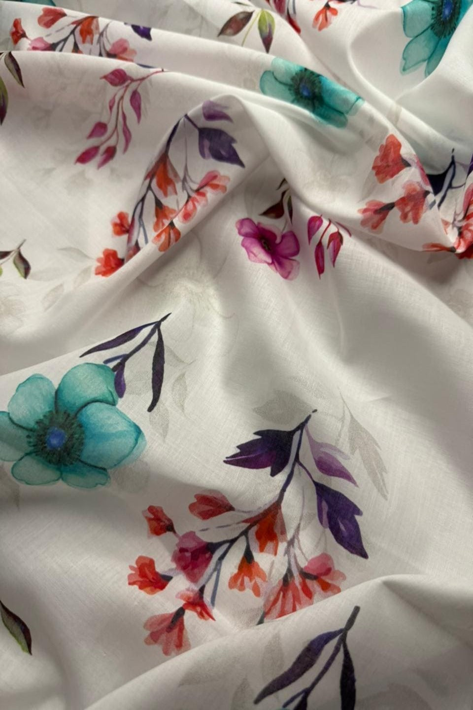 Floral fabric with colorful flowers on a white background